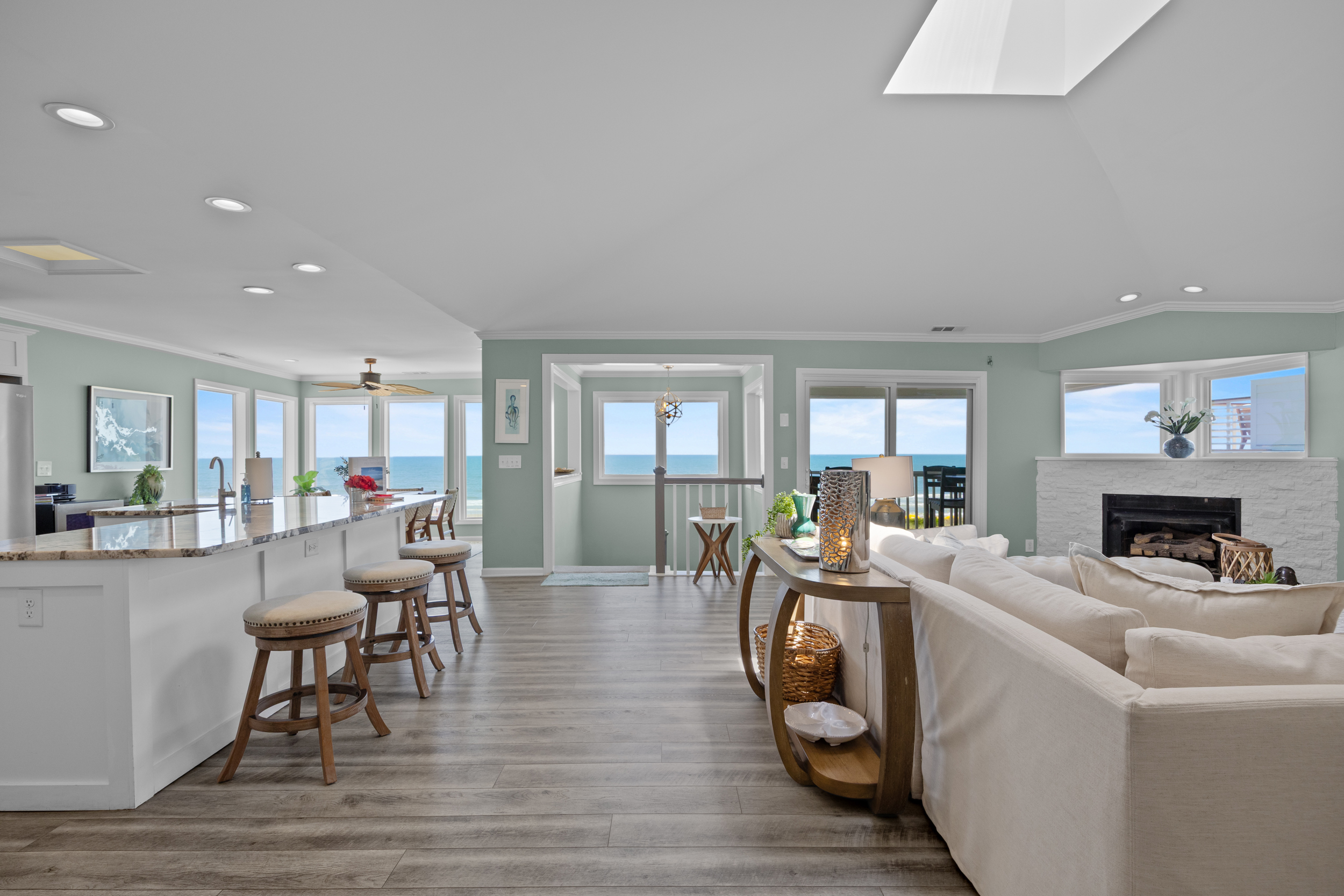 Open living and kitchen level with ocean views through the front windows