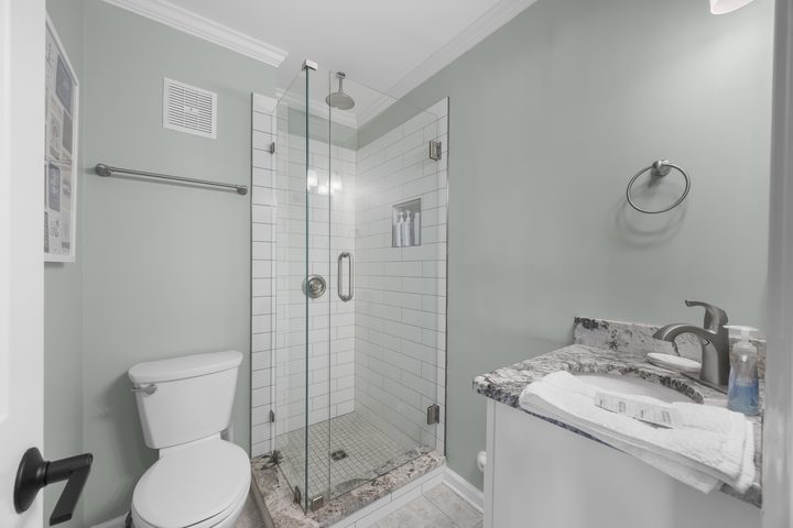 Third bathroom with shower and vanity