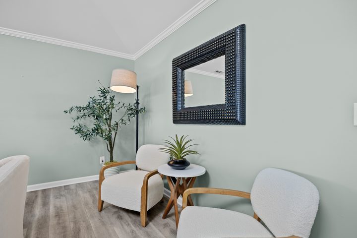 Conversation seating with armchairs facing the sofa