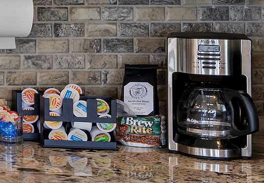 Coffee set out on the counter in the morning