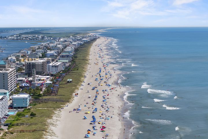 Aerial view along the shoreline and canal